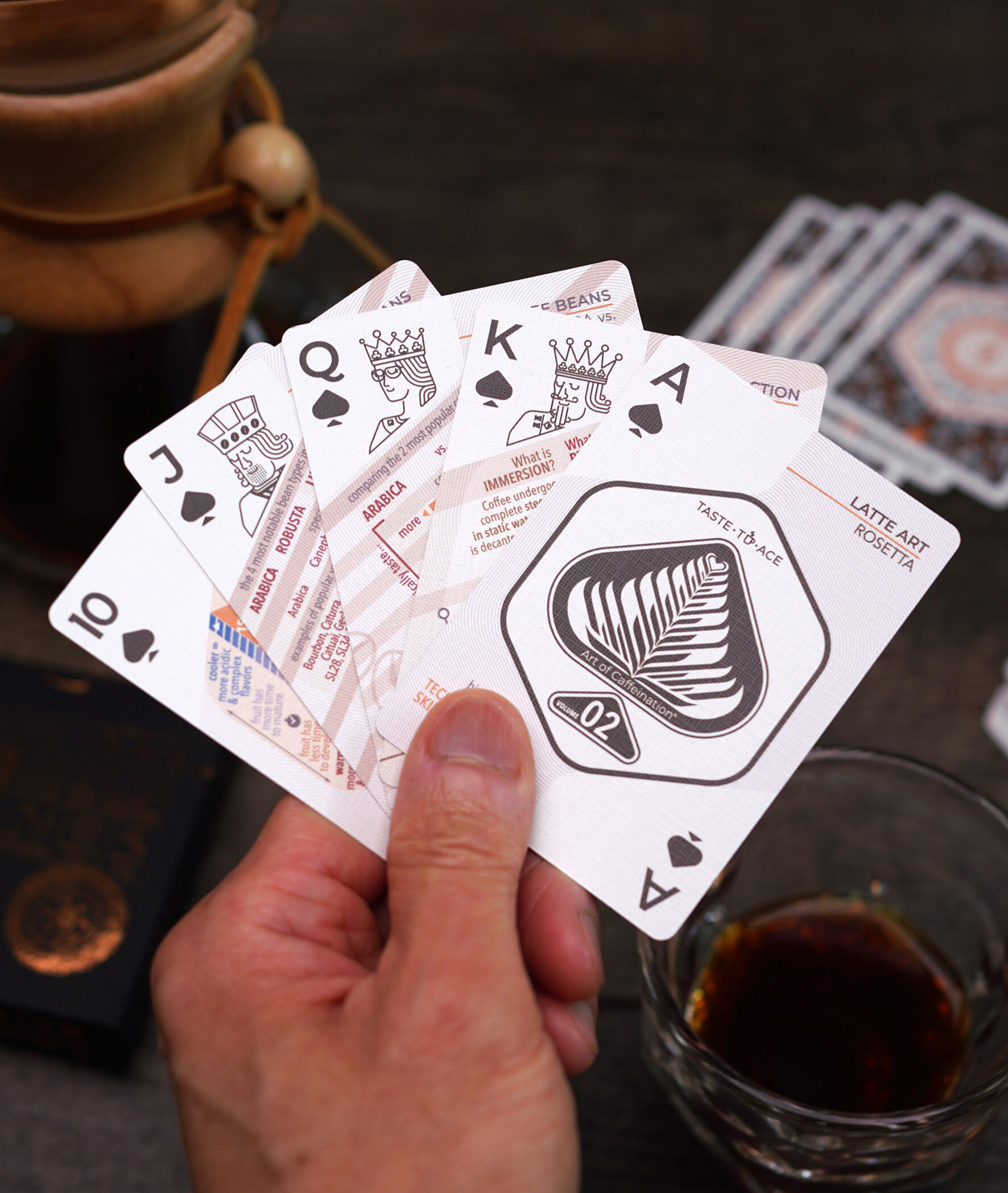 Taste-to-Ace deck in hand Image of Taste-to-Ace deck, royal flush in hand